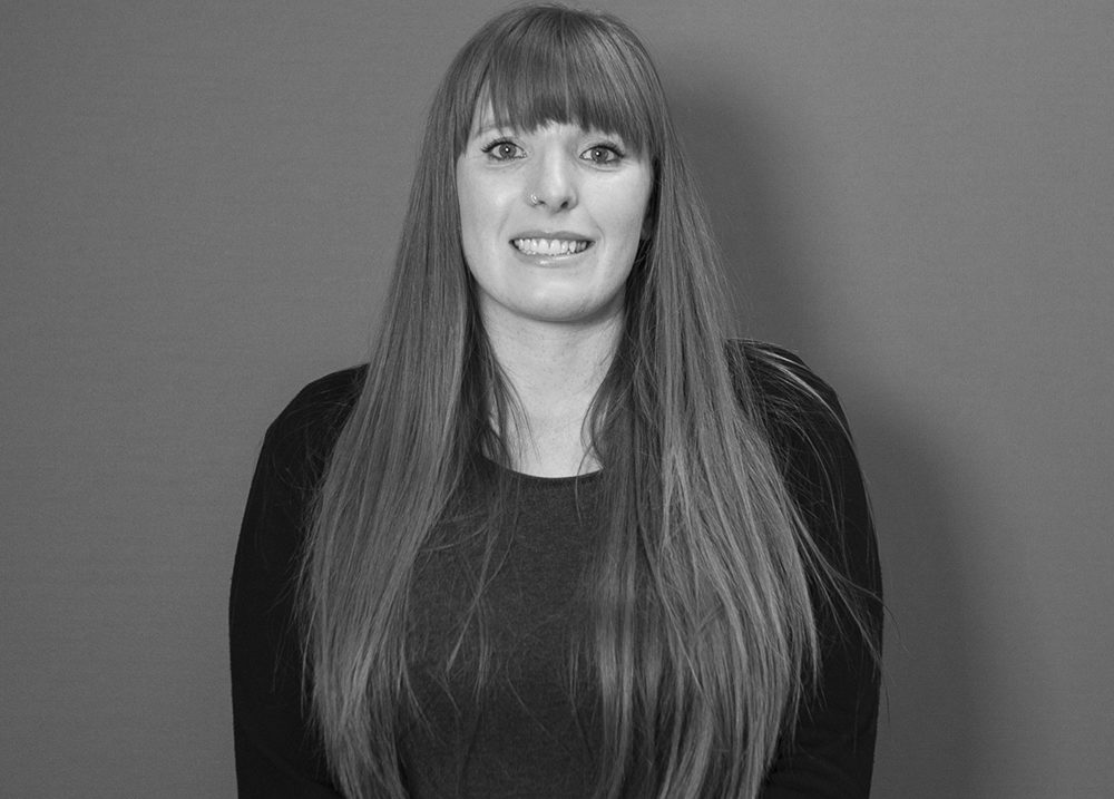 Black and white photo of Solutions employee Jody Kendall
