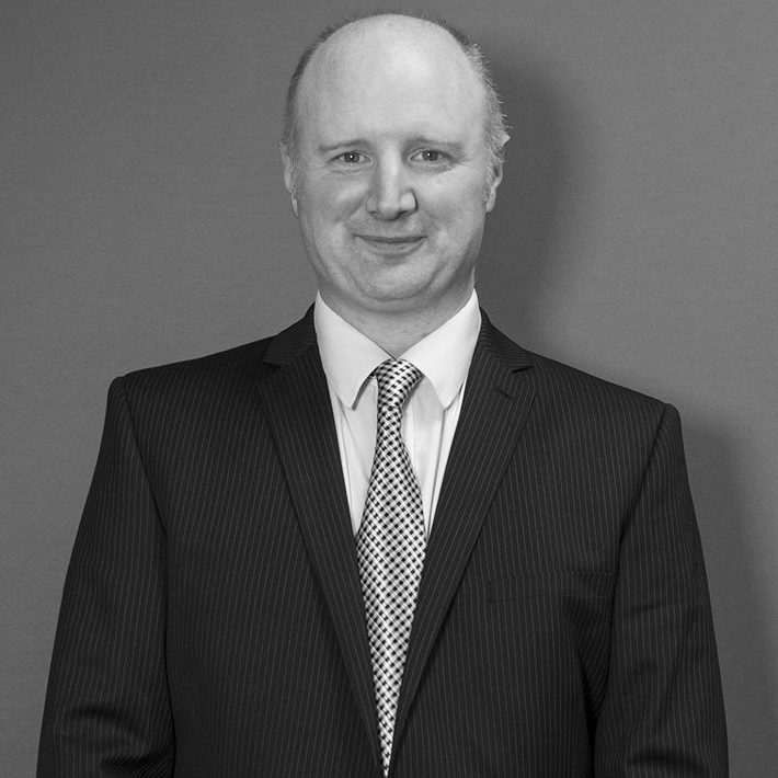 Black and white photo of Solutions employee Nick Hempshall