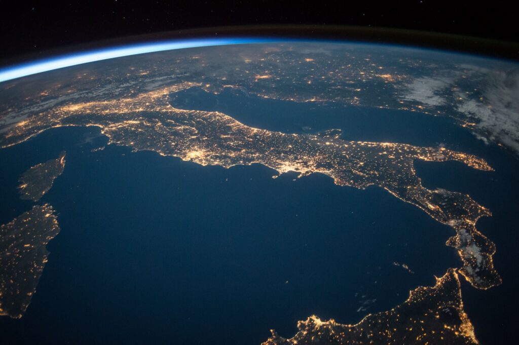The earth as shown from space showing italy lit up