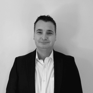 Solutions employee Colin Goodbrand black and white profile photo