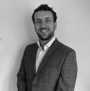 Solutions employee Dan Gillard black and white profile photo
