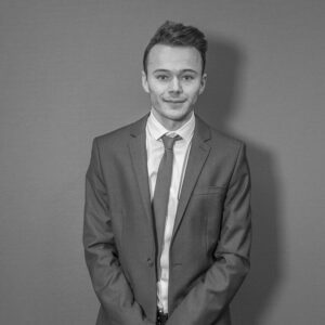 Solutions employee Joe Paton black and white profile photo