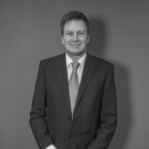 Solutions employee Will Ingleby black and white profile photo