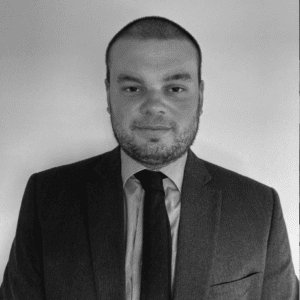 Solutions employee Andy Flynn black and white profile photo