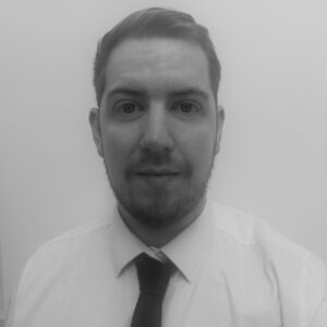 Solutions employee Chris Allcock black and white profile photo