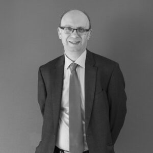 Solutions employee Iain Barker black and white profile photo