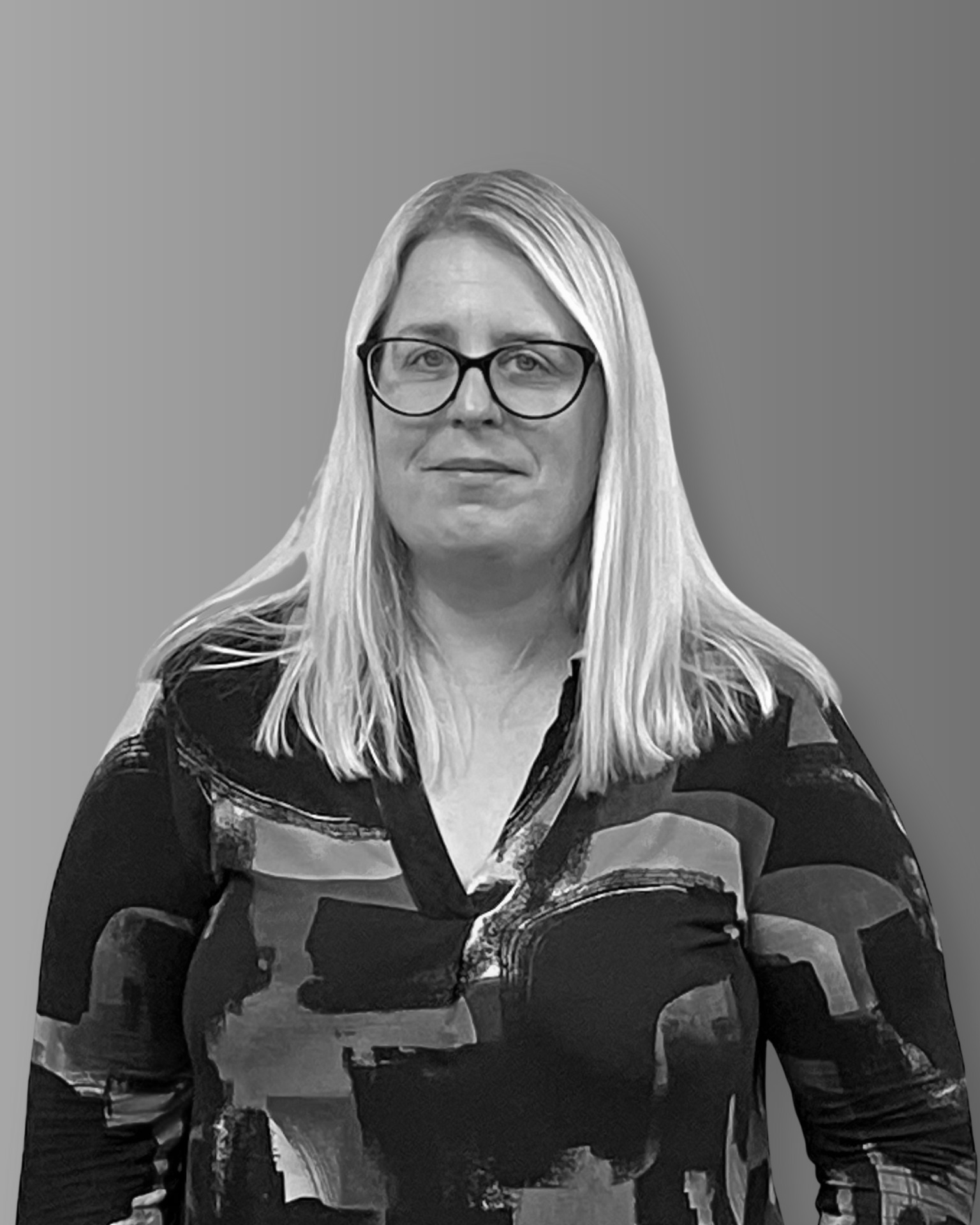 Solutions employee Leonie Williams black and white profile photo