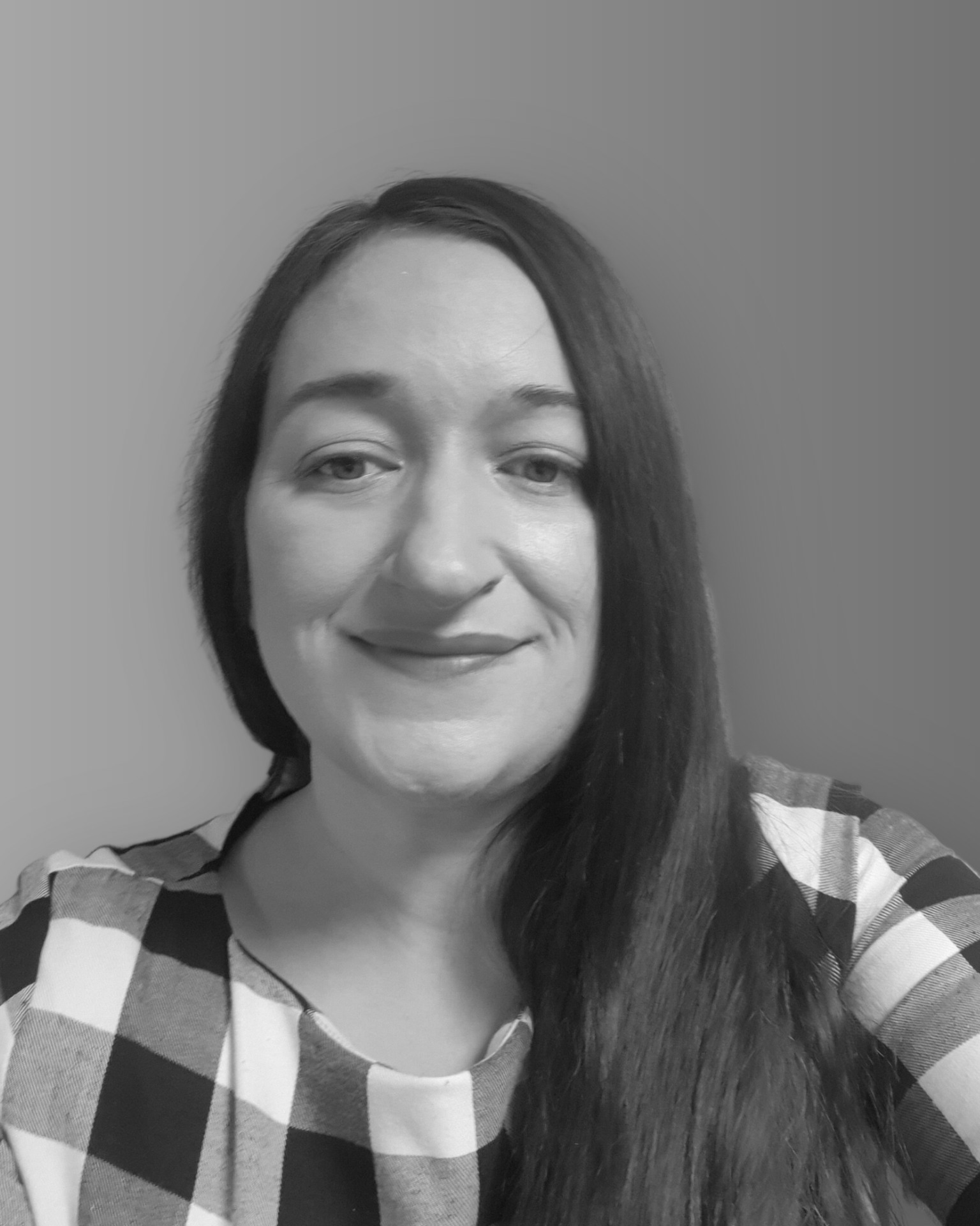 Solutions employee Karen Newman black and white photo