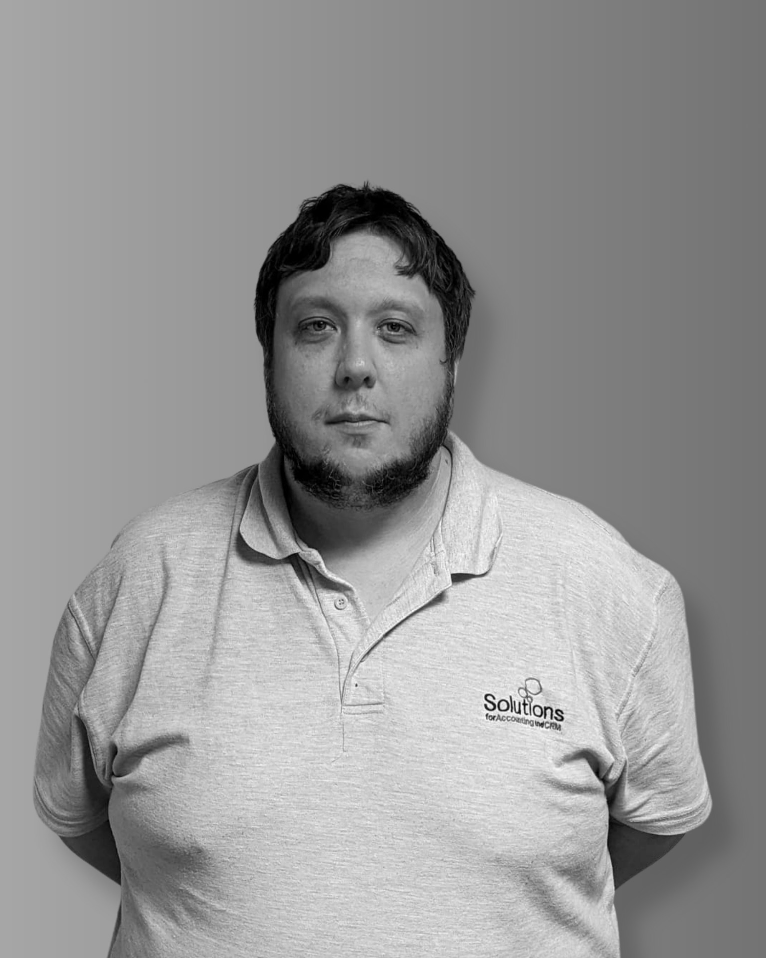 Solutions employee Neil Larsen black and white profile photo