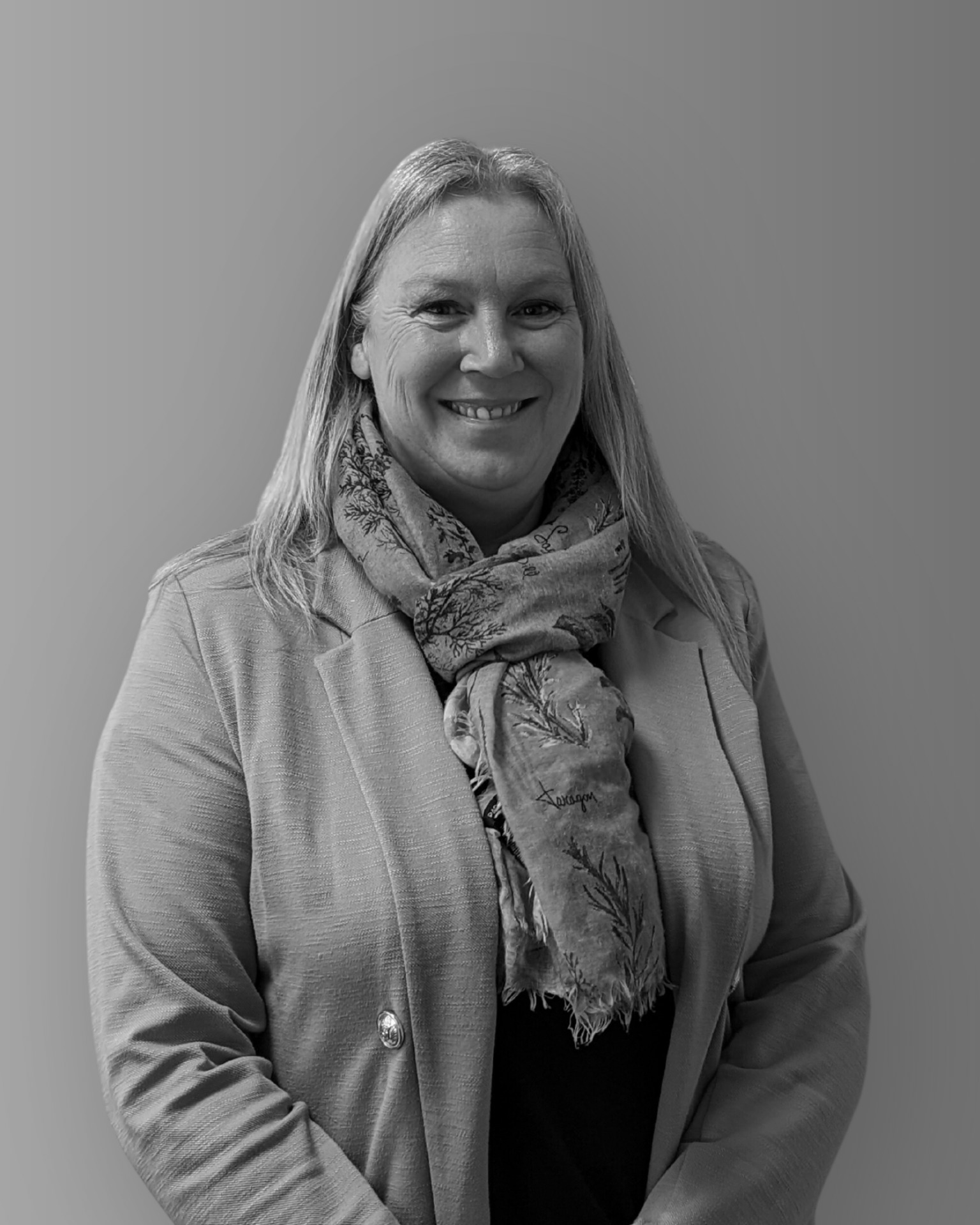 Solutions employee Jonny Taylor black and white profile photo