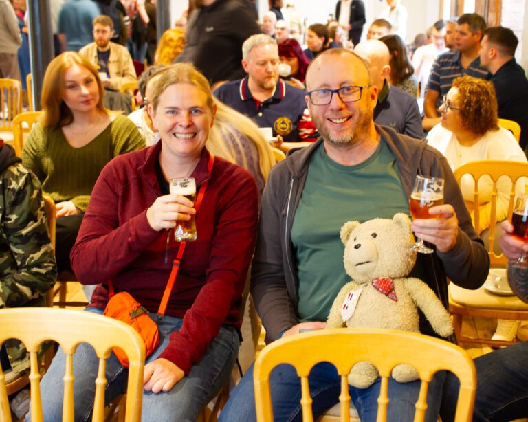 Solutions employees Anna and Terry enjoying a pint at the Hook Norton brewery