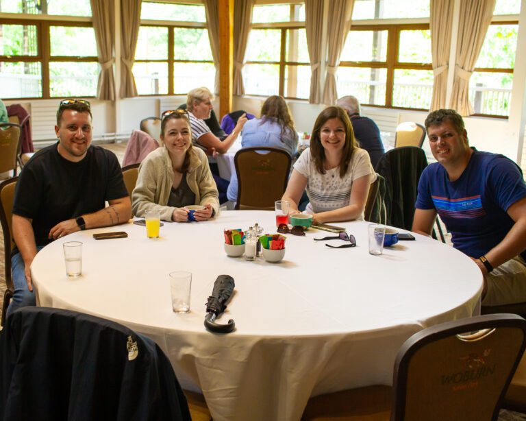 Several staff members from Solutions for Accounting with their spouses