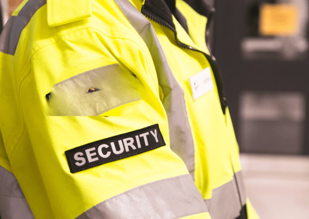 Person wearing a hi-vis security jacket