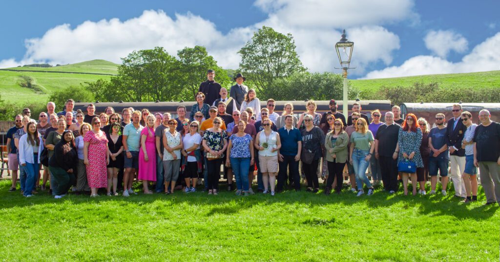 A team photo of Solutions that was taken during one of their weekends away.