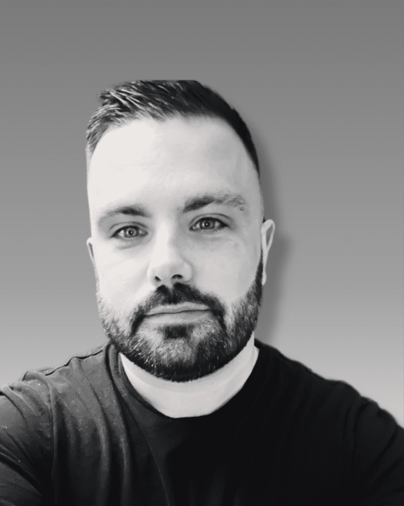 Black and white profile photo of Solutions' employee Jonathan Clarke