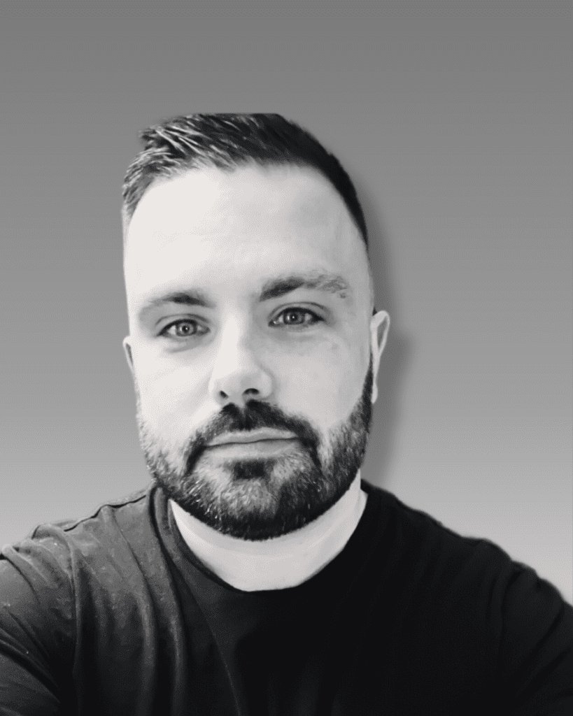 Black and white profile photo of Solutions' employee Jonathan Clarke