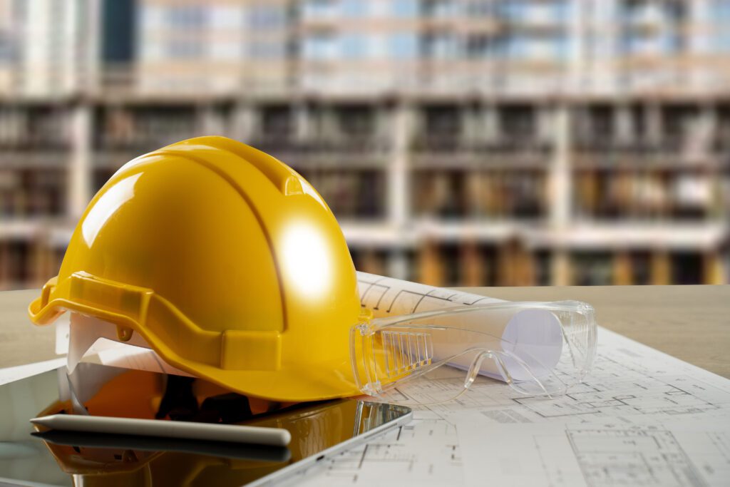 Sage Intacct for Construction - Engineer architect industry 4.0 using computer construction site, industrial and innovation infographic at building futuristic architect control innovation safety design.