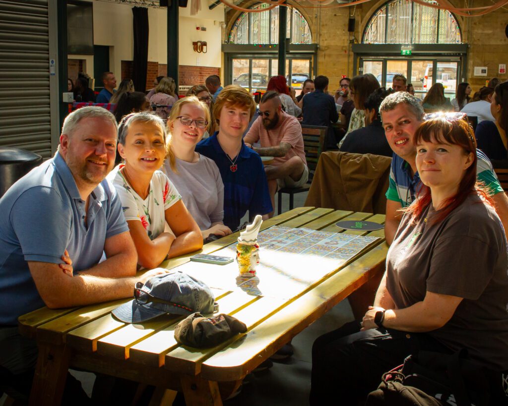 Group of Solutions for Accounting employees and their partners sitting down at a restaurant in Hull