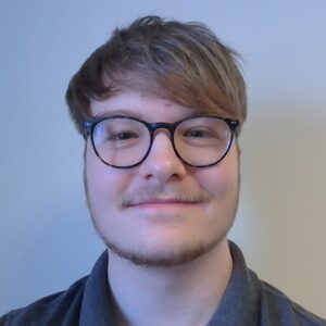 Solutions employee Nicholas Marshall black and white profile photo Solutions employee Nicholas Marshall black and white profile photo