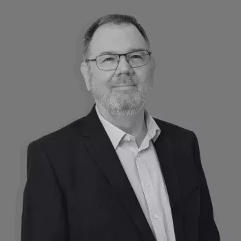 Solutions employee Alastair Mackintosh black and white profile photo