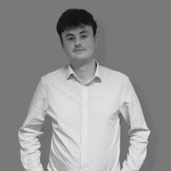 Solutions employee Benjamin Smyth black and white profile photo